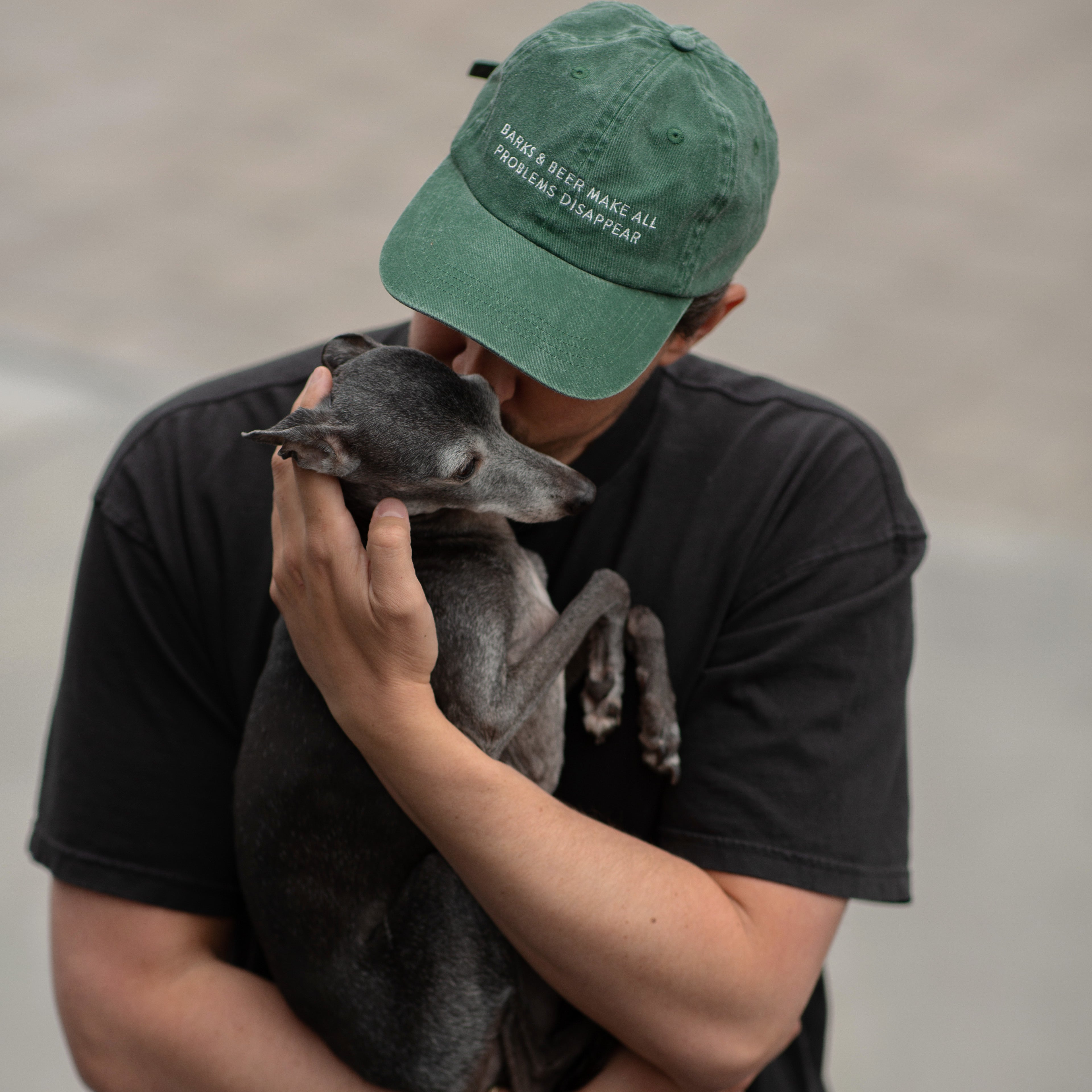green-denim-cap-barks-and-beer-make-all-problems-disappear-wearing-man.jpg